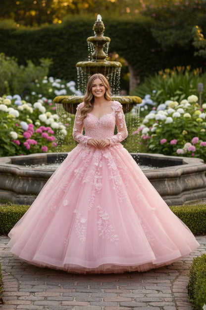 Woman in a pink long sleeve floral lace ball gown quinceañera dress by a garden fountain