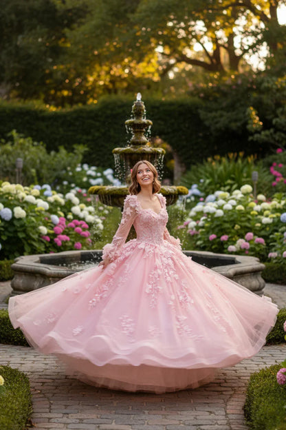 Woman in a pink long sleeve ball gown with floral lace, twirling near a garden fountain