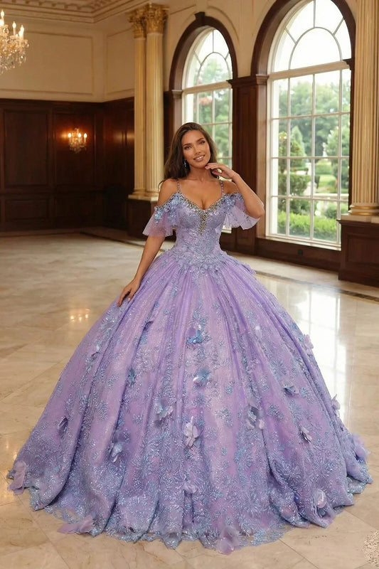 Woman in a purple ball gown with 3D butterfly appliques and embroidery in elegant hall