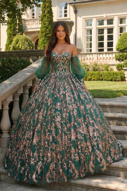 Emerald glittery ball gown with cold shoulders and sheer sleeves, perfect for formal events