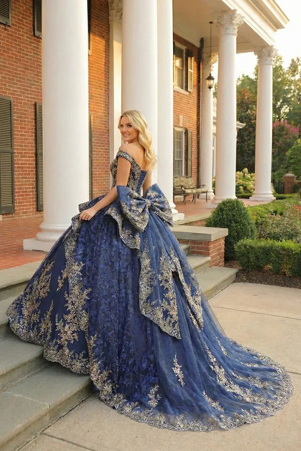 Carmina Layered Ruffled Ball Gown Cold Shoulder Quinceañera Dress With Floral Embroidery and Bow in Blue - product view