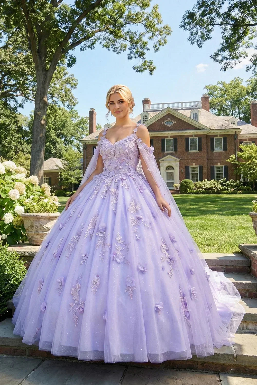 Woman outdoors in lilac ball gown with 3D floral applique and cold shoulder design