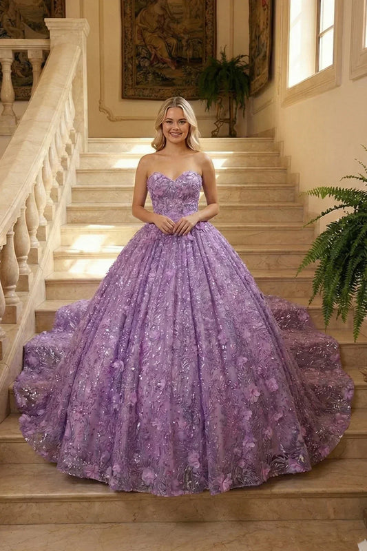 Woman in a lavender ball gown with floral embroidery and sequins on grand staircase