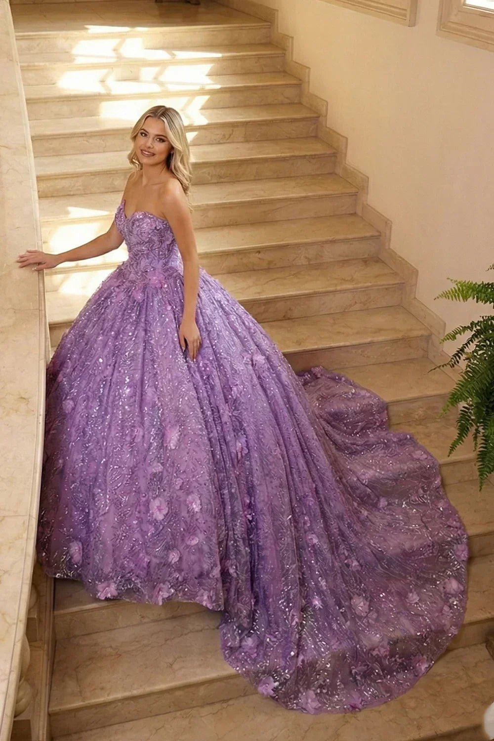 Woman wearing a strapless lavender ball gown with floral embroidery and sequins on marble stairs