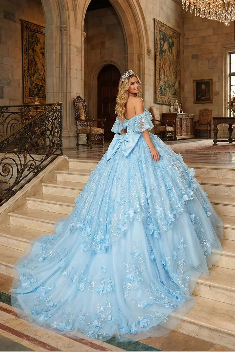 Nayeli Textured Ruffle Ball Gown V Neck Quinceañera Dress With Bow and 3D Floral in Blue - product view