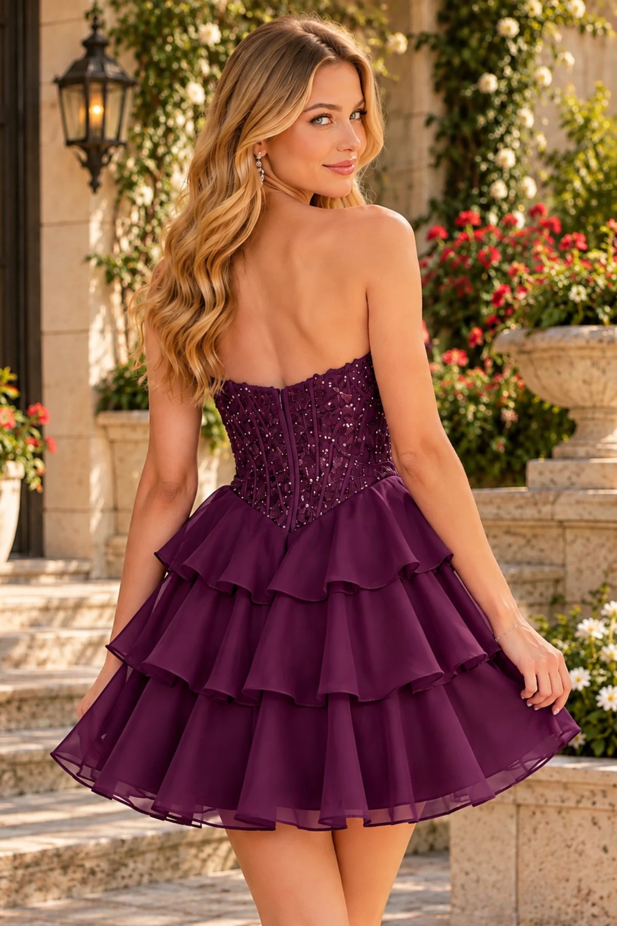 S8794H Nell strapless homecoming mini dress with a sparkling back bodice and three-tier skirt in Plum - back view