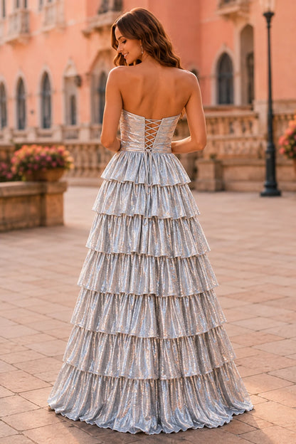 Aladora Cutout Tiered A-Line Prom Dress in Metallic Silver prom gown, back view