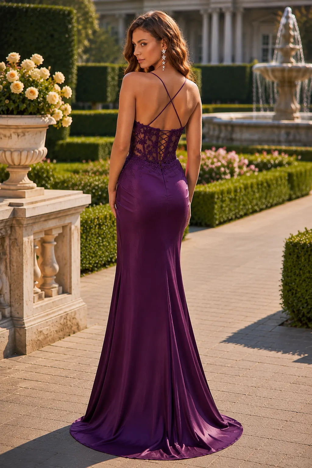 Deep Plum embellished-bodice prom gown with a slit, back view