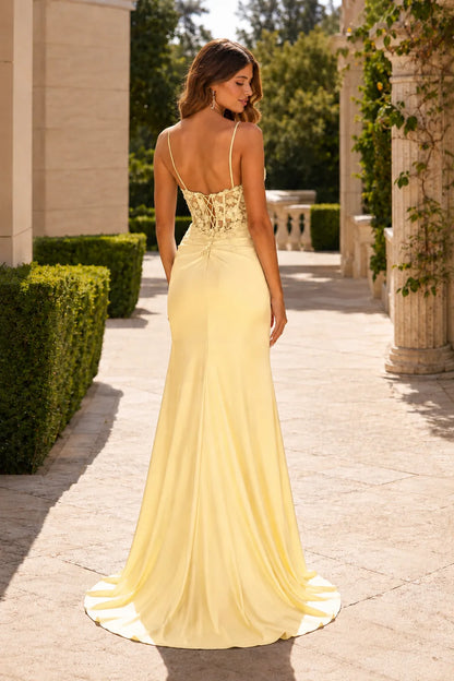 Burgundy strapless embellished prom gown with a slit, back view