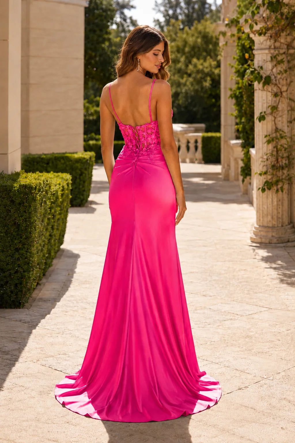 Deep Navy strapless embellished prom gown with a slit, back view
