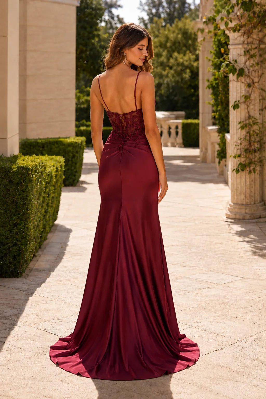 Emerald Green strapless embellished prom gown with a slit, back view