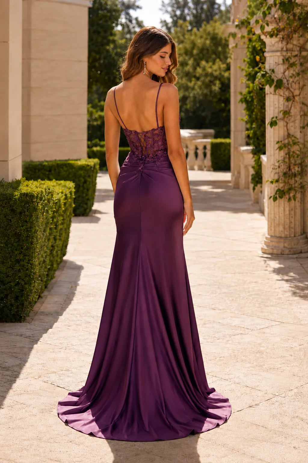 Royal Blue strapless embellished prom gown with a slit, back view
